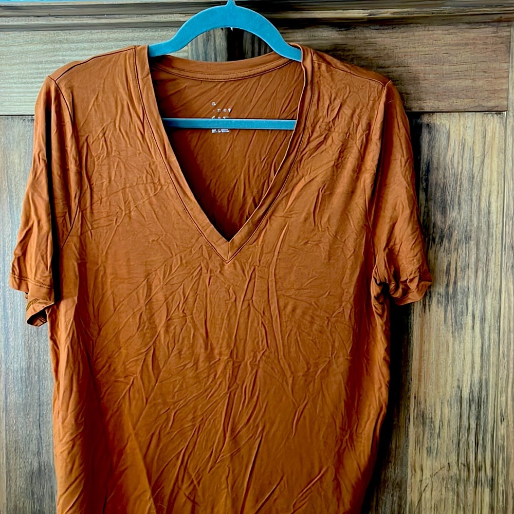 a.new day.  T shirt